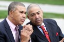 U.S. Rep. Lacy Clay, left, talks with his father, former U.S. Rep. Bill Clay at the ceremony naming the Poplar Street Bridge for the senior Clay.