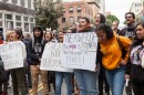 Protesters chant while holding various signs at a rally against Immigration and Customs Enforcement (ICE) in San Francisco.