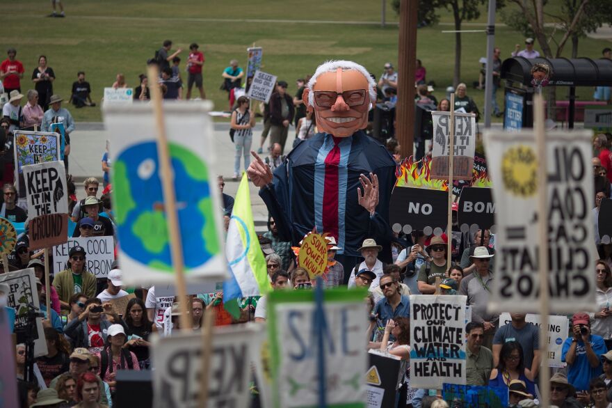An oversized puppet of Democratic presidential candidate Bernie Sanders stands above demonstrators at the March to Break Free from Fossil Fuels on Saturday in Los Angeles.