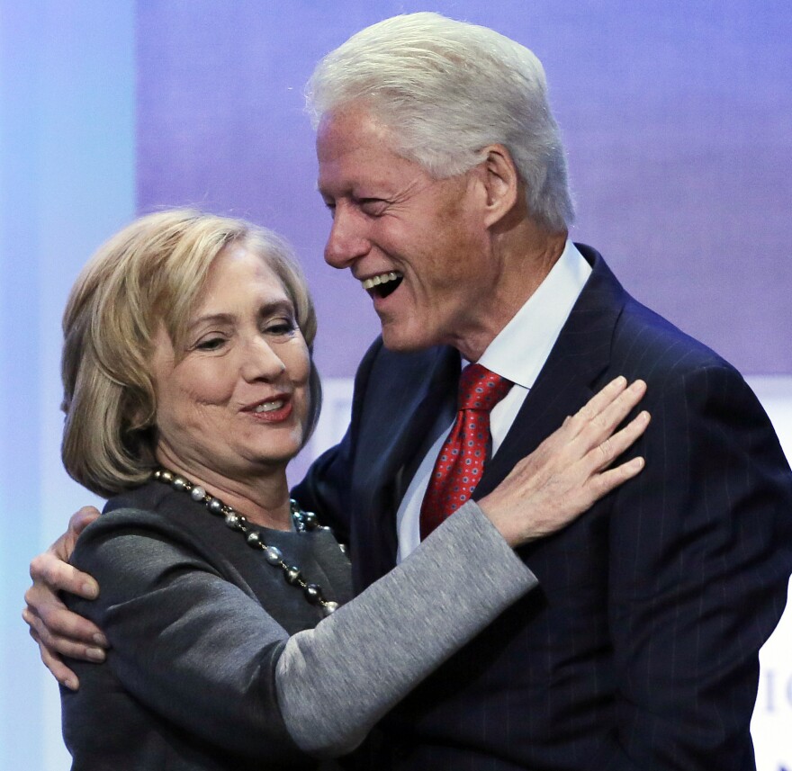 Former Secretary of State Hillary Clinton and husband Bill Clinton at an event for the Clinton Global Initiative.