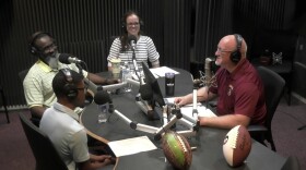 WFSU's Tallahassee Benchwarmers podcast is recorded in-studio. 4 people are seated at an oval table