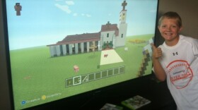 Will Davidson and his Minecraft creation, modeled off the Santa Cruz Mission