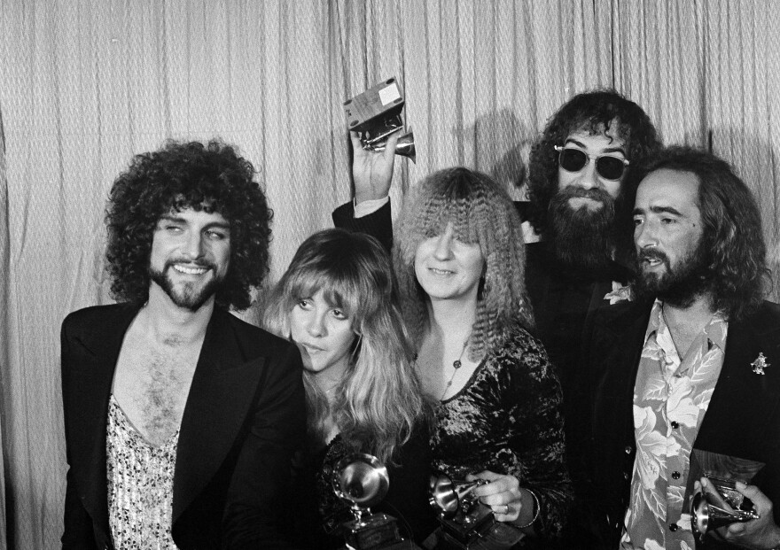 Members of Fleetwood Mac (from left) Lindsey Buckingham, Stevie Nicks, Christine McVie, Mick Fleetwood and John McVie pose with their Album of the Year Grammy Award for "Rumours" in Los Angeles on Feb. 23, 1978.