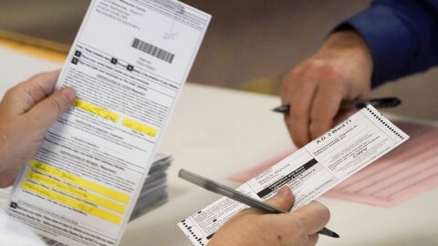 Workers count Milwaukee County ballots on Election Day at Central Count on Nov. 3, 2020, in Milwaukee. A top Milwaukee elections official has been fired after sending falsely obtained military absentee ballots to the home of a Republican state lawmaker who has been an outspoken critic of how the 2020 election was administered, the city's mayor said Thursday, Nov. 3, 2022.