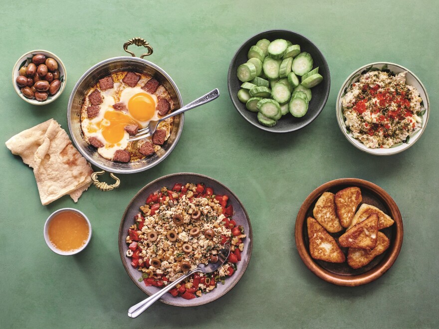 Kassis explores the cross-cultural culinary history of the Arab world in her cookbook, <em>The Arabesque Table.</em> Shown above (clockwise from top left): sujuk fried eggs; "secret" Shankleesh salad; fried Arabic white cheese; labaneh, red chili and egg salad.