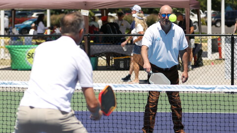 Medford Parks, Recreation and Facilities Director Rich Rosenthal returns a shot while playing pickleball during the ribbon cutting celebration on June 5, 2026 for The Courts by Lithia & Driveway at Howard Memorial Sports Park.