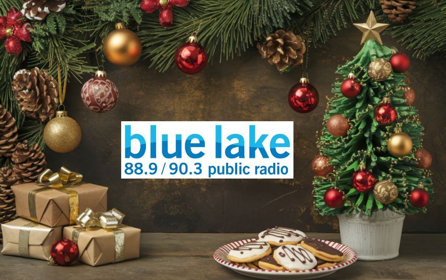Holiday table with cookies and small tree blue lake public radio logo