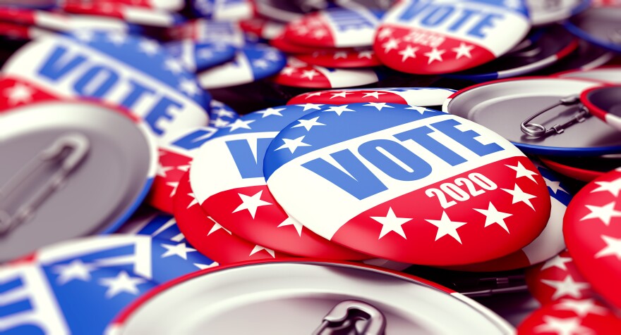 Red white and blue buttons reading vote 2020