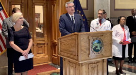 Gov. Eric Holcomb announces a Marion County woman is Indiana's first COVID-19 death.