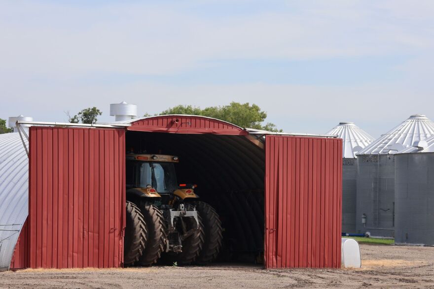 A tractor sits inside a shed at Mike Langseth's farm in Barney, N.D., on Fri. July 17, 2026.