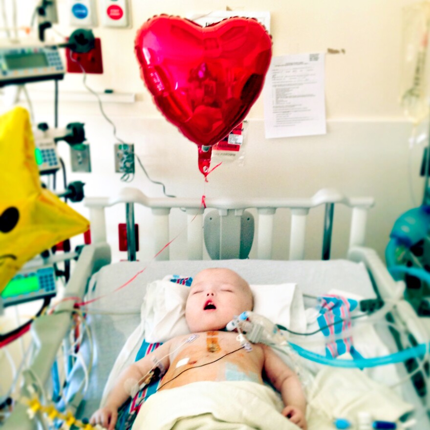 Garrett rests in his hospital bed on Valentine's Day, several weeks after his surgery.