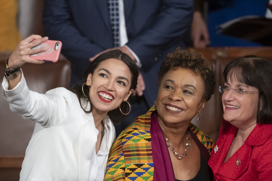 Rep.-elect Alexandria Ocasio-Cortez, a freshman Democrat representing New York's 14th Congressional District, takes a selfie with Rep. Ann McLane Kuster, D-NH, and Rep. Barbara Lee, D-Calif., on the first day of the 116th Congress with Democrats holding t