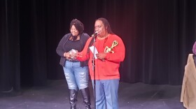 Ed Mabrey hosting the first Gods and Goddesses Poetry Slam: A National Competition. Sheri (Purpose) Hall on the left.