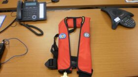 Boat safety officials are always stressing the importance of life jackets on people, not stuck away on the boat.