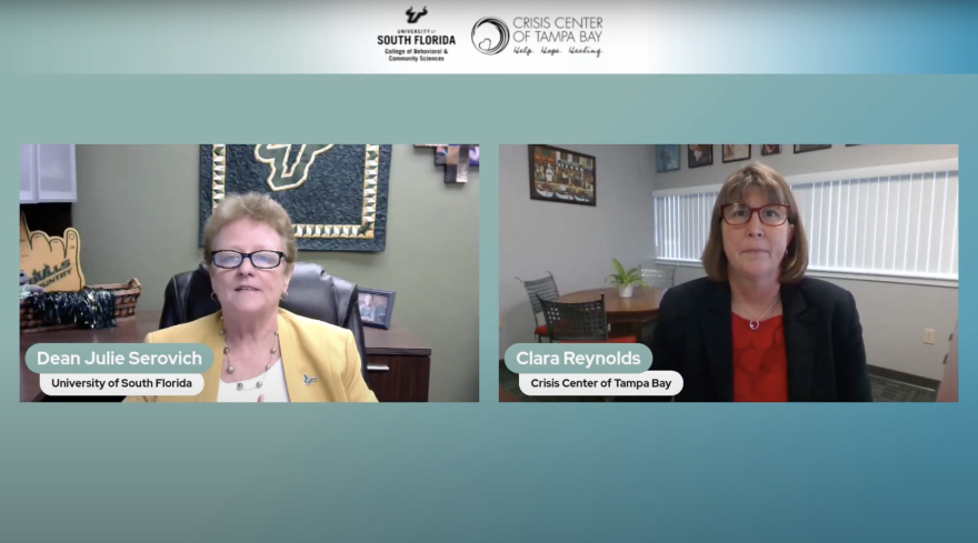 Two women dressed in business casual clothing sitting at desks while speaking virtually.