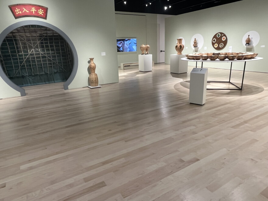 Vivian Chiu’s sculptures began as wooden shipping crates that held porcelainware as they traveled from Asia to the United States. Her artwork explores the complexities of being connected to a place from afar.