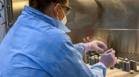 Pacific Northwest National Laboratory staff technician Yuliya Farris prepares sterile spaces used to hold soil in place for an experiment dubbed the Dynamics of the Microbiome in Space, known as DynaMoS. A SpaceX resupply mission will transport soil samples to the International Space Station, likely June 10.