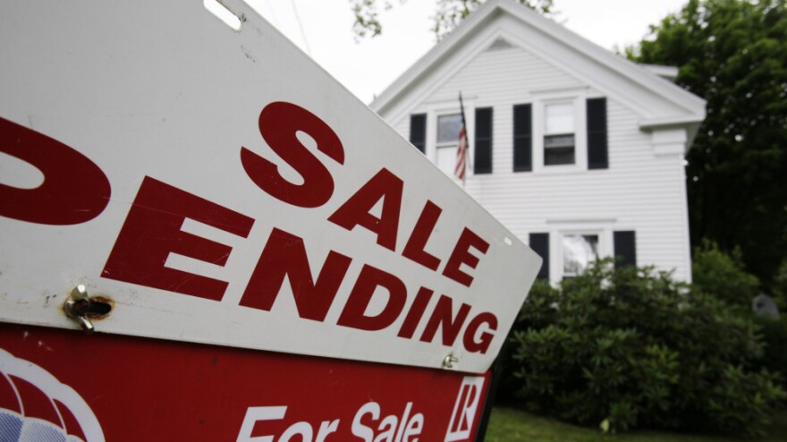 A "sale pending" sign outside a home in Bath, Maine, in July.