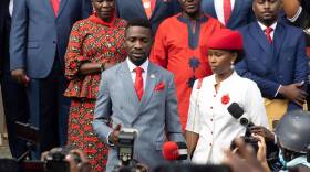 Bobi Wine and his wife, Barbie Itungo
Kyagulany, address the media before leaving their house for the Presidential
Nominations on Nov. 03, 2020
in Kampala, Uganda. Popular singer Robert
Kyagulanyi Ssentamu, better known by his stage name of H.E. Bobi Wine, is set to
appear before the Independent Electoral Commission this morning to be nominated to
stand against incumbent Yoweri Museveni in the up
coming Presidential elections in
Uganda. (Photo by Luke Dray/Getty Images)