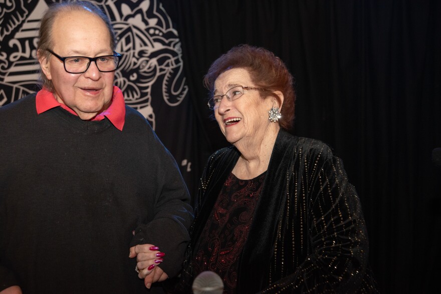 Longtime musical collaborators singer Mary Lou Gnoza and pianist Stevie Haberman enjoy a laugh as they stand for a portrait between sets at their monthly performance at The Emerald of Siam in Richland, Washington. (Credit: Annie Warren / NWPB)
