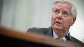 FILE - Sen. Lindsey Graham, R-S.C., introduces Adm. Kevin Lunday, acting commandant of the U.S. Coast Guard, during a Senate Commerce, Science and Transportation Committee hearing on the nomination Lunday for Commandant of the Coast Guard, Nov. 19, 2025, on Capitol Hill in Washington. (AP Photo/Julia Demaree Nikhinson, File)