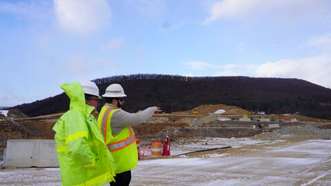 PennDOT Secretary Mike Carroll (left) and Caleb Meighen (right,) the site's inspector in charge stand at the I-80/I-99 high-speed interchange work site. Officials expect work to be complete by the fall of 2030. 