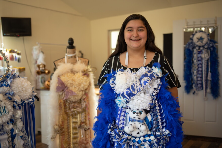 Maya Gonzalez, 13, the daughter of Shannon Gonzalez, sports her fifth specialized mum. It's decked out with her favorite color and stuffed animal, and her initials, lights and feathers. 
