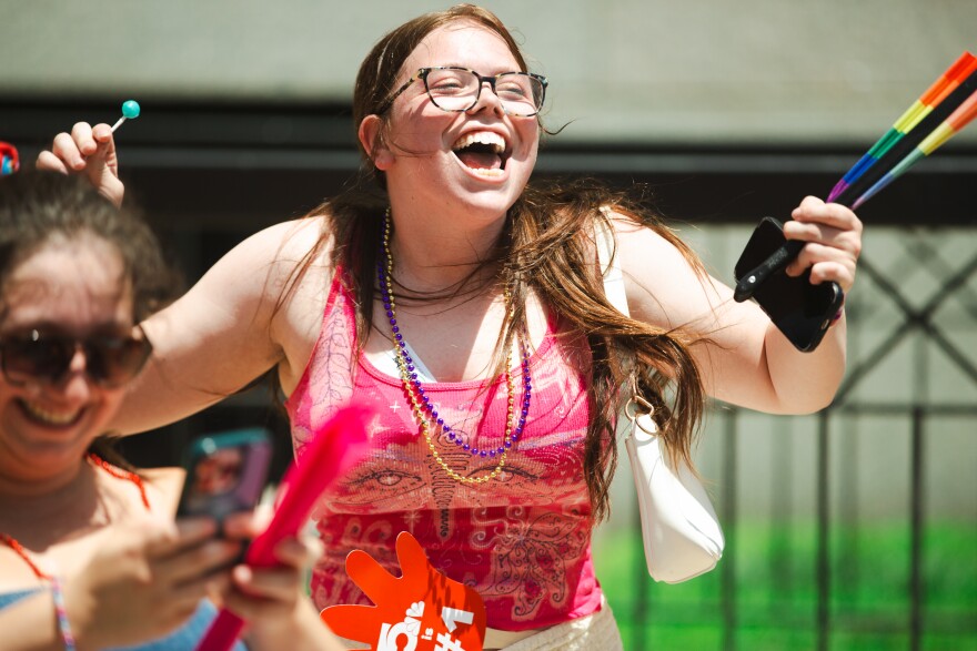 Kate Poindexter cheers for the “Hamburgler” as the McDonald’s float passes by during the annual Pride parade in downtown St. Louis on Sunday, June 28, 2026.