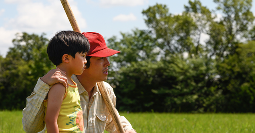 Alan Kim and Steven Yeun in "Minari."