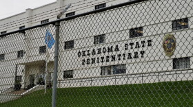 Barbed wire and fencing surrounding the Oklahoma State Penitentiary in McAlester is pictured on Sept. 5, 2025.