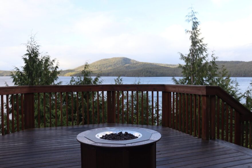 The recently-purchased property is equipped with numerous amenities, including an outdoor deck and fire pit.