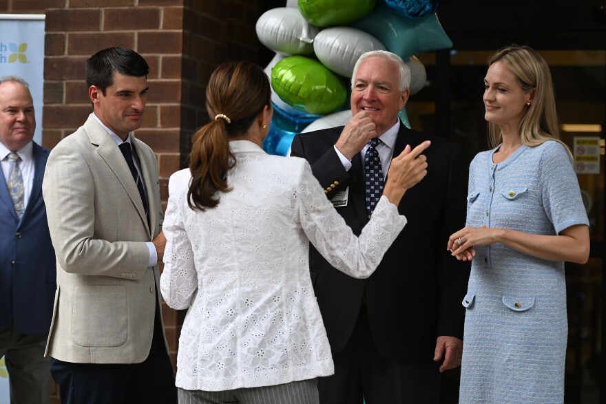 U.S. Rep. Rob Bresnahan, state Rep. Bridget Kosierowski and Scranton Mayor Paige Cognetti speak to Michael Clark, President of Commonwealth Health at Regional Hospital of Scranton, while Regional and Moses Taylor Hospitals CEO Dr. Patrick Conaboy listens. 
