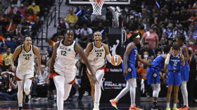 The Las Vegas Aces celebrate their win in the WNBA basketball Finals against the Connecticut Sun, Sunday, Sept. 18, 2022, in Uncasville, Conn.