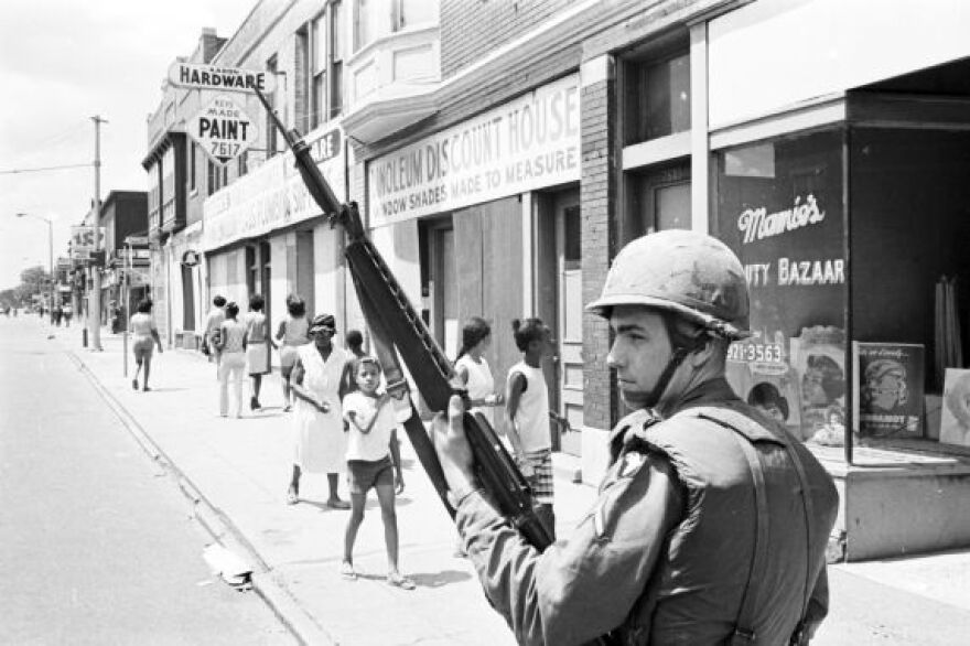 A National Guardsman patrols a Detroit street during the July 1967 rebellion.