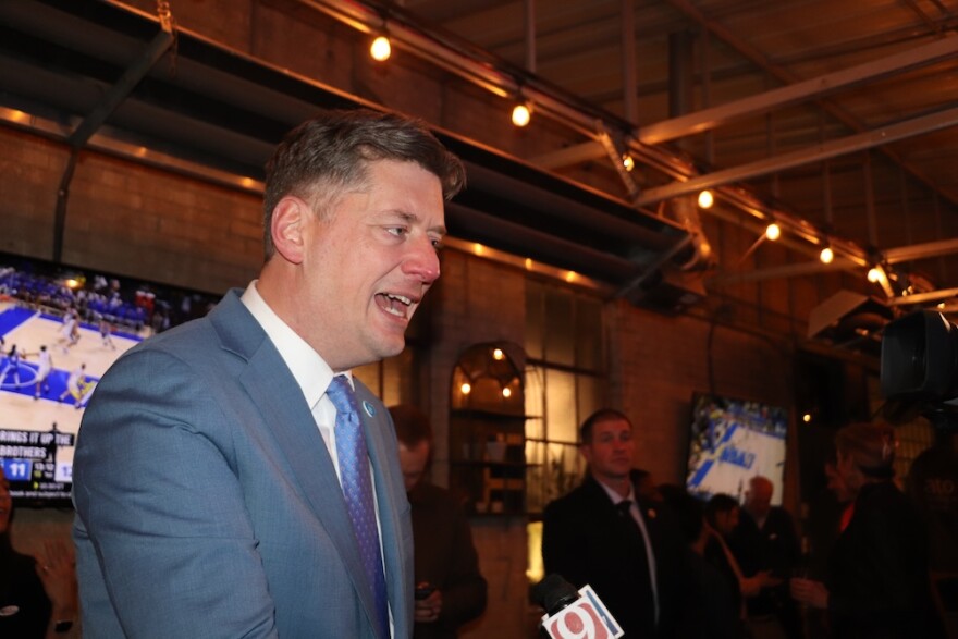 Oklahoma City Mayor David Holt speaks with reporter at his election watch party.