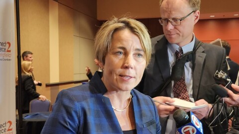 Massachusetts Gov. Maura Healey (D) speaks with reporters after addressing the Springfield Regional Chamber's Outlook lunch on March 10, 2023.