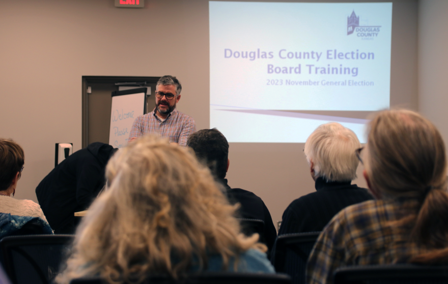 Douglas County Clerk Jamie Shew speaks to volunteer poll workers.