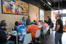 A community meeting, organized by Charlotte Urbanists, gathers at Manolo's Bakery to discuss how policy affects immigrant-owned businesses.