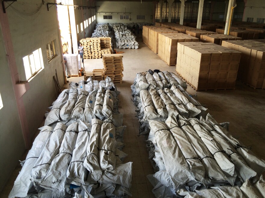 A Mercy Corps warehouse is filled with hygiene kits for distribution in Syria.
