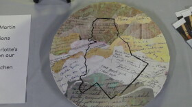 plate art piece with outline of Mecklenburg County