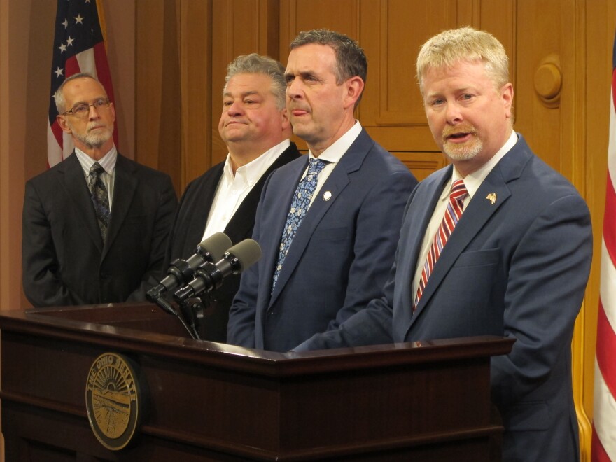 (from right to left) Sen. Sean O'Brien (D-Bazetta) and Sen. Michael Rullie (R-Salem) introduce bill to encourage the purchase of electric vehicles.  [Andy Chow]