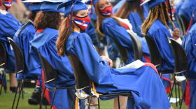 A high school graduation ceremony in South Bend, held outside due to COVID-19 safety precautions.