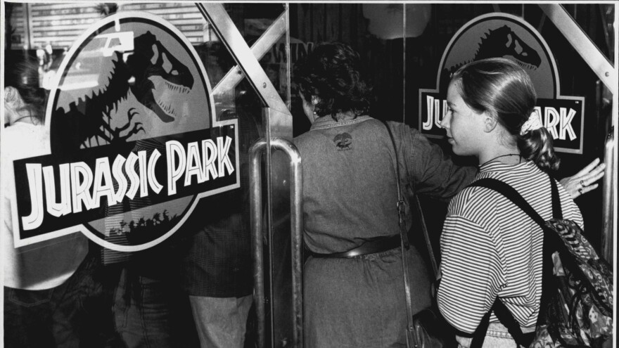 A crowd entering the theater to see <em>Jurassic Park</em>, photographed on October 5, 1993.