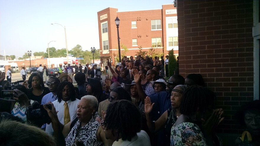 Mourners file in to Friendly Temple Baptist Church Monday for the funeral of Michael Brown.