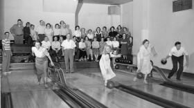 People bowling at an alley