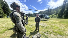In this handout photo provided by the Snohomish County Sheriff's Office deputies participate in the search for Travis Decker, at an undisclosed location in Washington state, Friday, June 6, 2025.