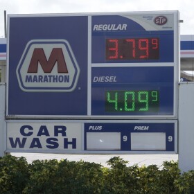 A customer pumps gas at a Marathon gas station, Tuesday, Aug. 22, 2023, in North Miami.