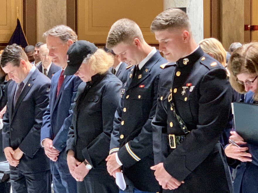 Evan Bayh, second from left, with his wife Susan and sons Nick and Beau at the Statehouse memorial for Evan's father, Birch Bayh.