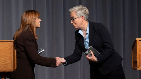 Republican state Sen. Christine Drazan, left, and Democratic Gov. Tina Kotek shake hands at the end of the gubernatorial debate in Eugene, Ore. at the University of Oregon, on Thursday, Oct. 1, 2026.