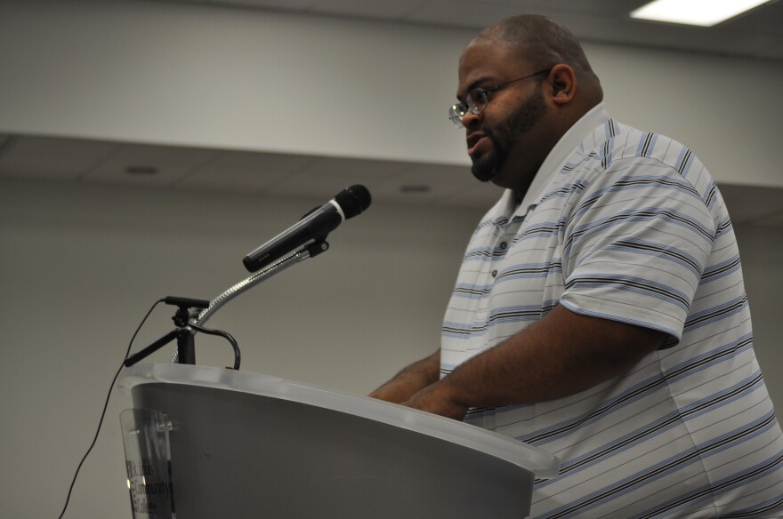 Jauquin Holmes of St. Louis said law enforcement has become a militaristic, fraternity-like culture that creates distrust within communities.